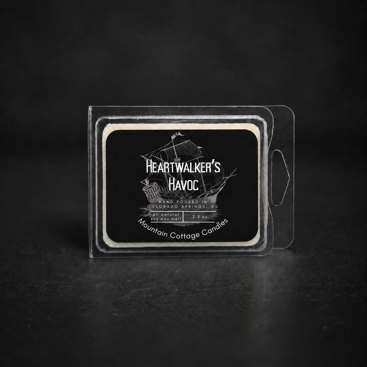 Heartwalker's Havoc soy wax melt in a clear clamshell pack, black label with a tall ship under full sail