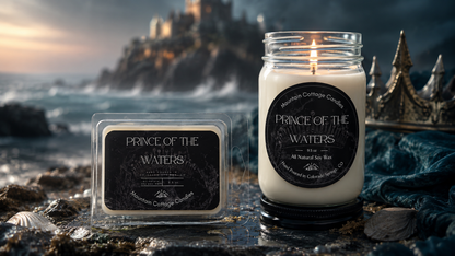 Prince of The Waters lit soy candle and wax melt on wet rocks at a stormy shore, a clifftop castle and dark metal crown behind